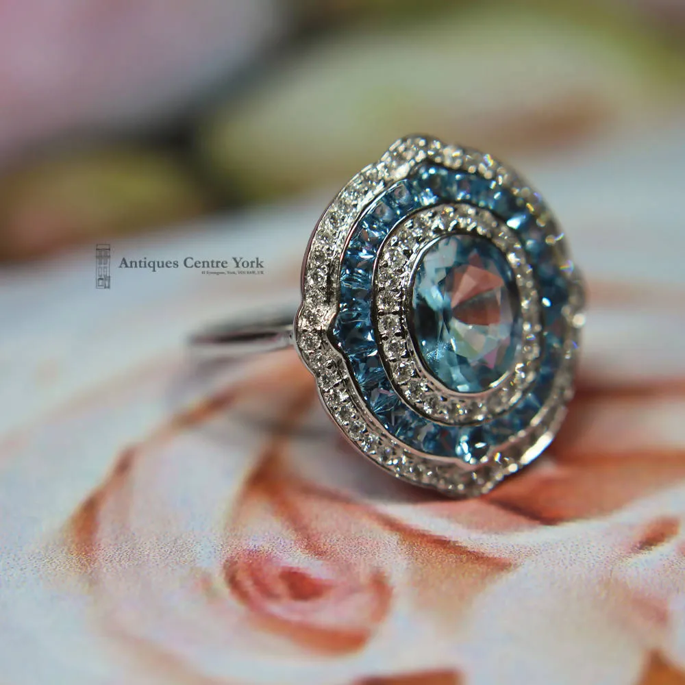 18ct White Gold Aquamarine & Diamond Oval Cluster Ring