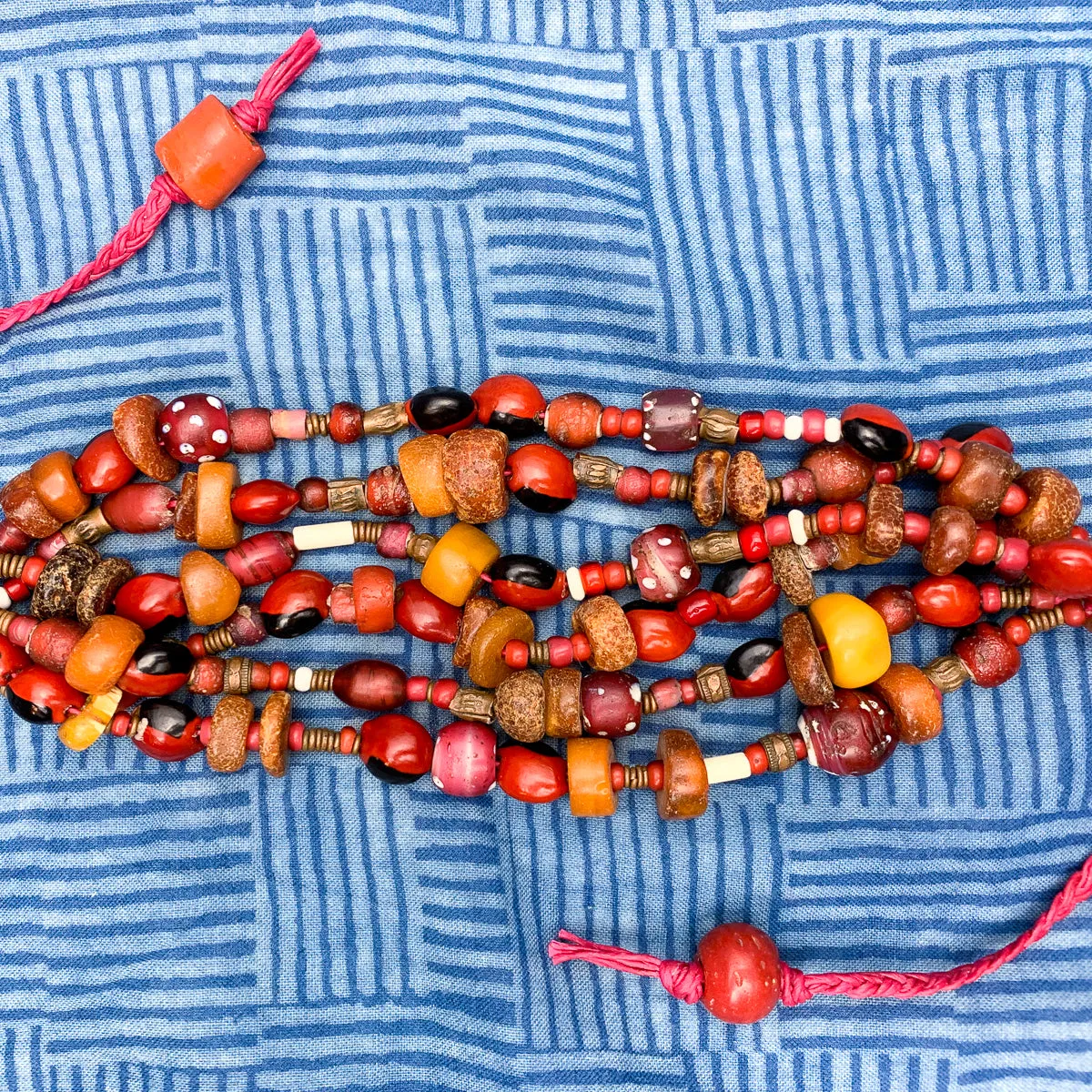 18th Century Baltic Amber with 19th Century Venetian White Heart Trade Bead Multi Strand Tie Bracelet