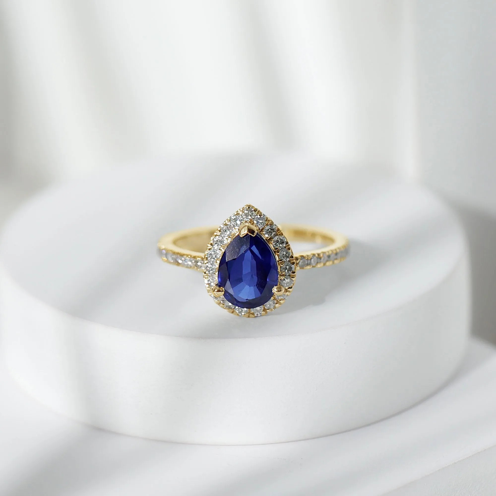 2 CT Created Blue Sapphire Teardrop Ring with Diamond Halo