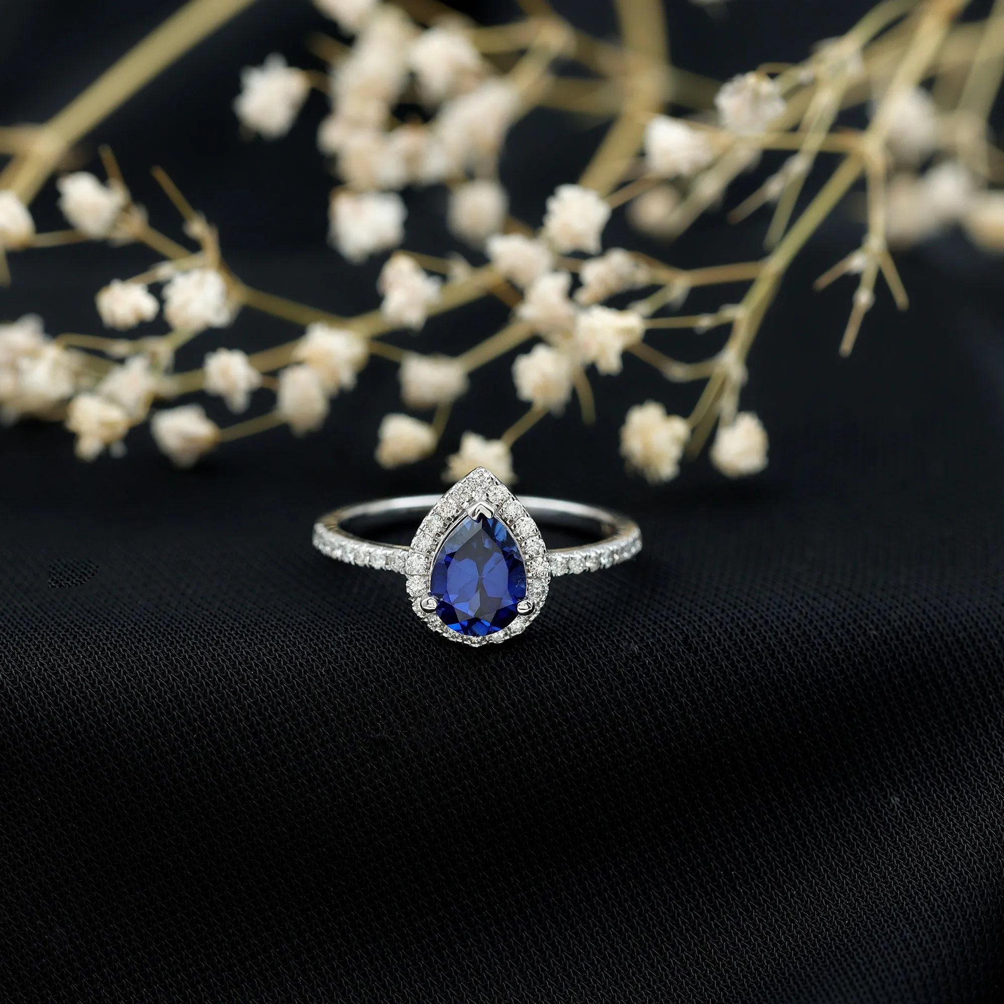 2 CT Created Blue Sapphire Teardrop Ring with Diamond Halo