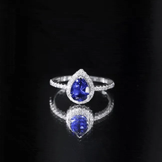 2 CT Created Blue Sapphire Teardrop Ring with Diamond Halo