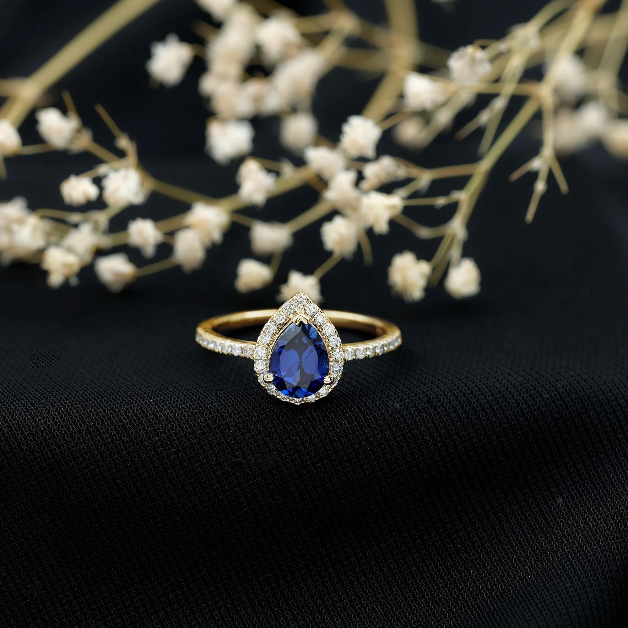 2 CT Created Blue Sapphire Teardrop Ring with Diamond Halo