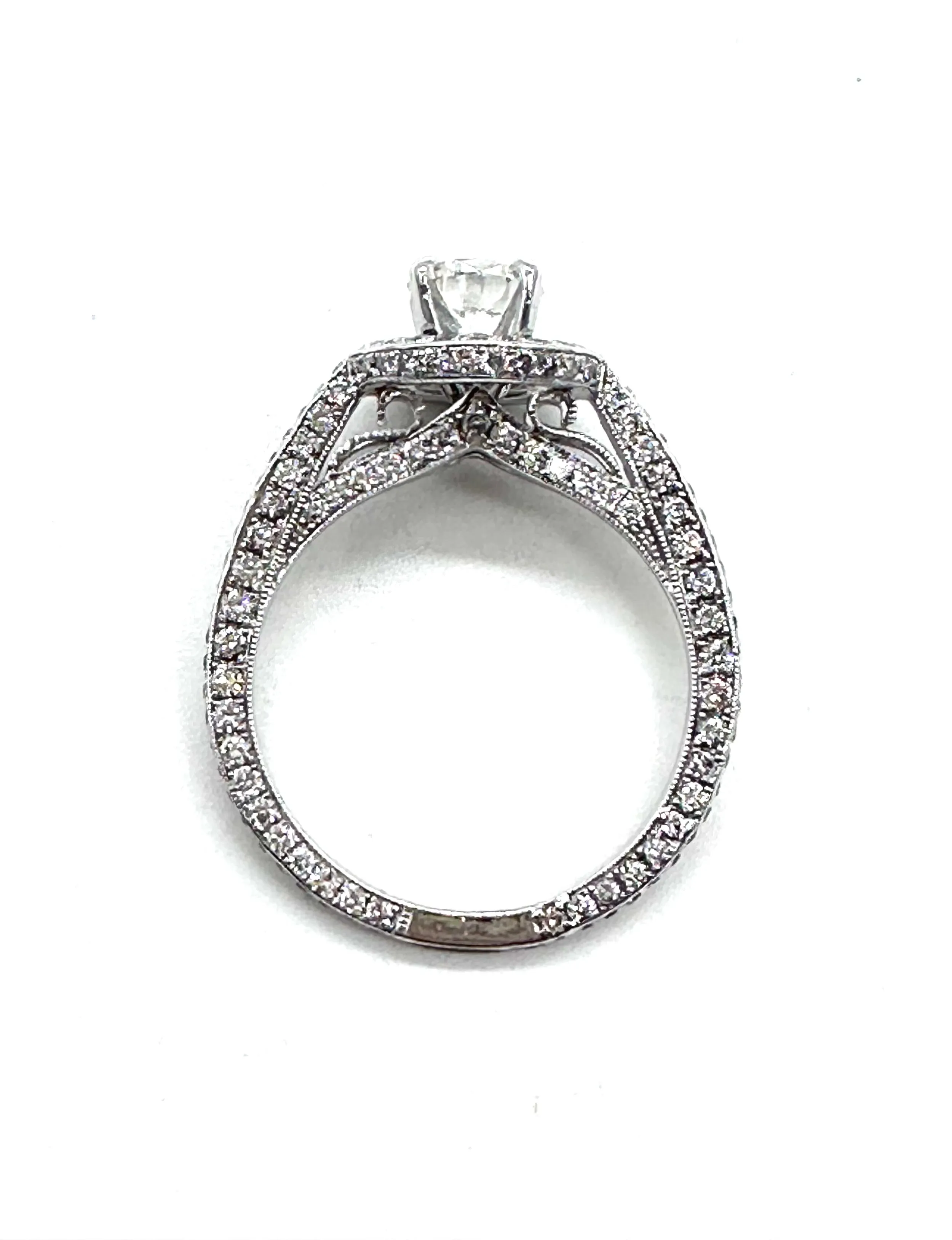 Diamond halo cathedral ring