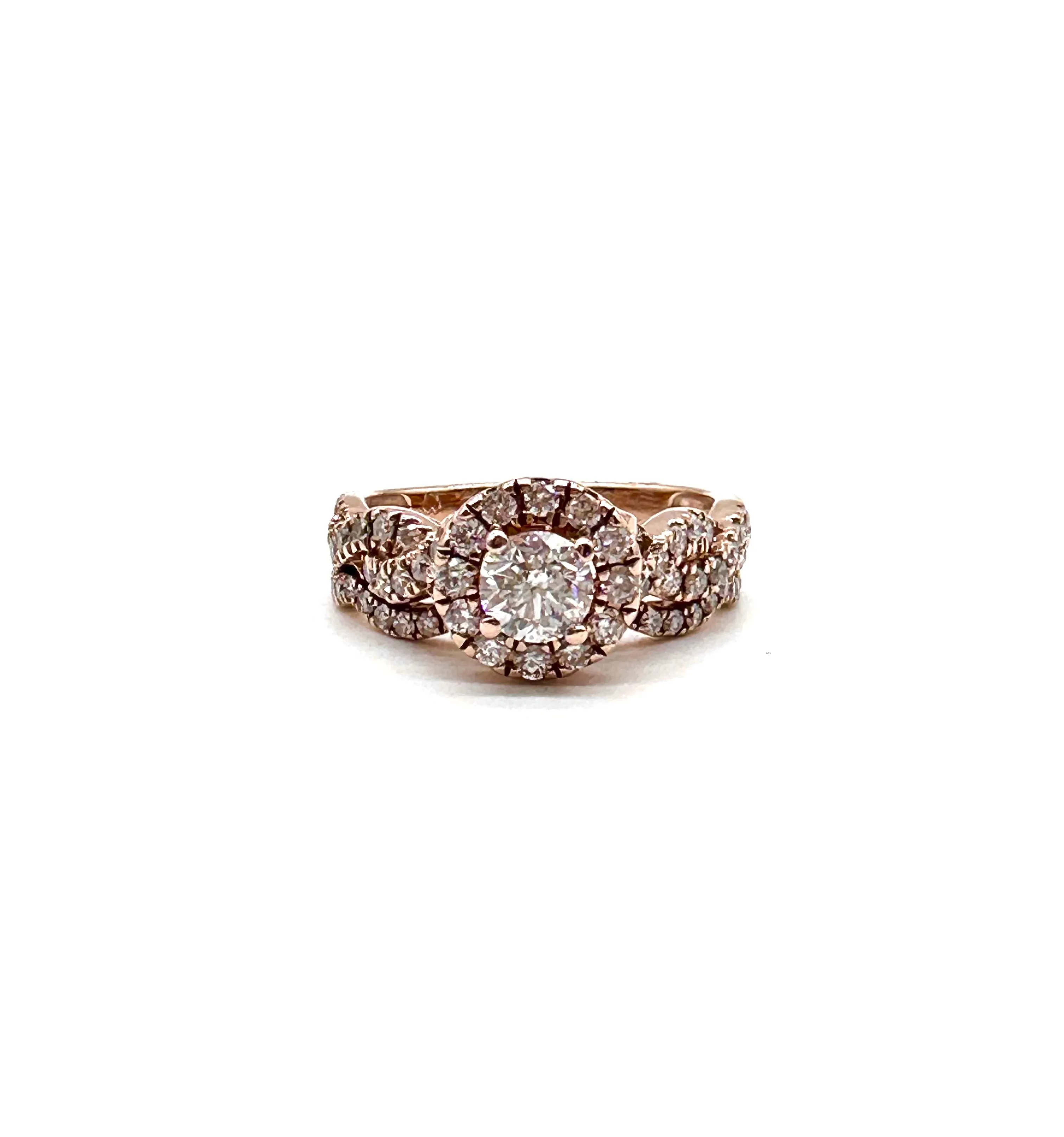 Diamond halo rose gold twist ring