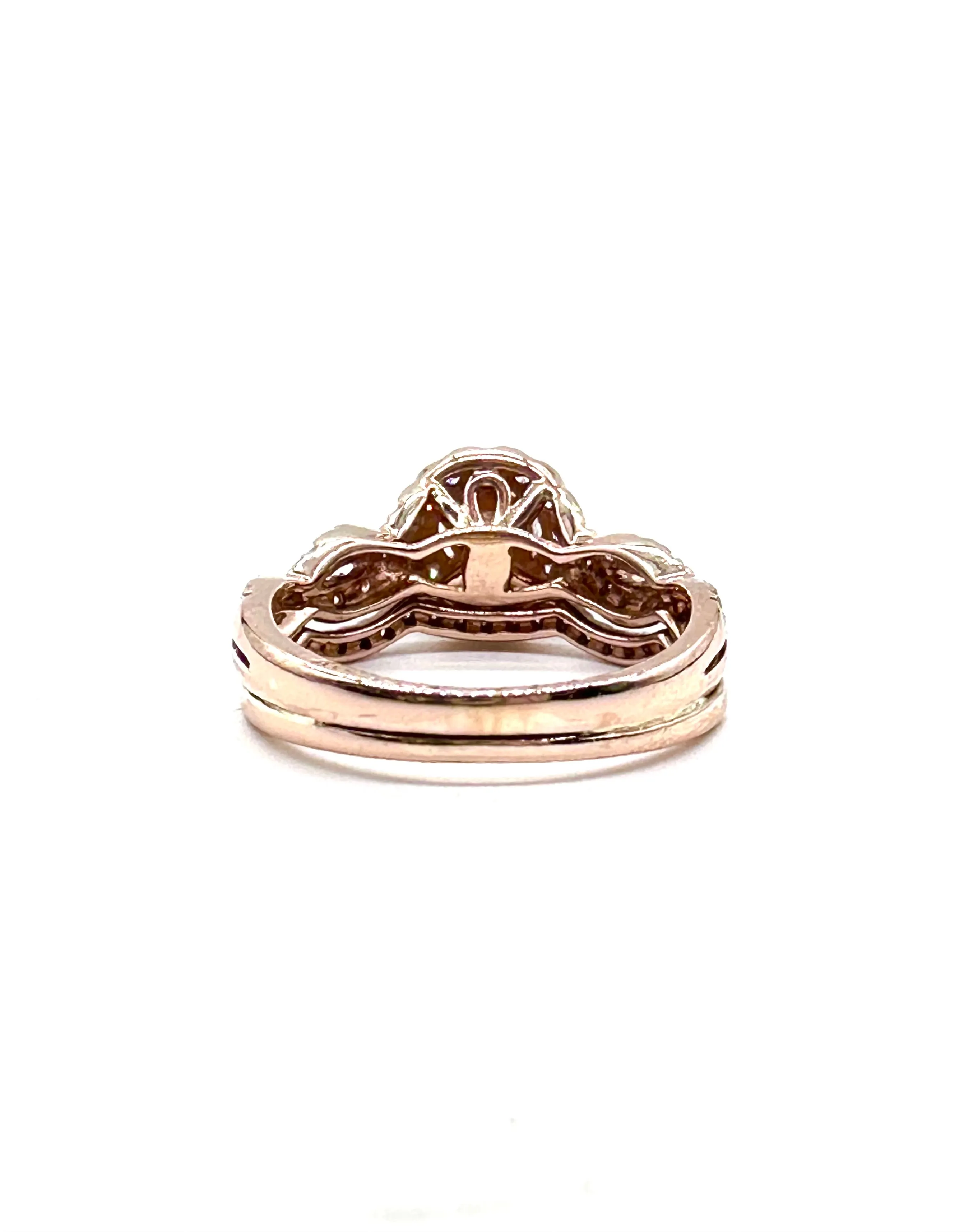 Diamond halo rose gold twist ring