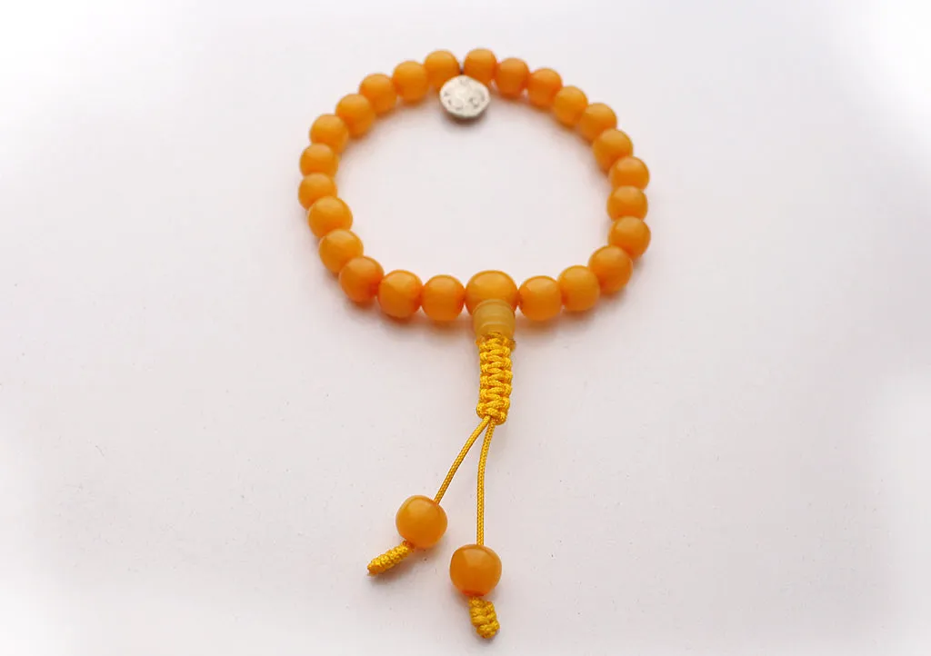 Faux Amber Beads Wrist Bracelet with Om Charm