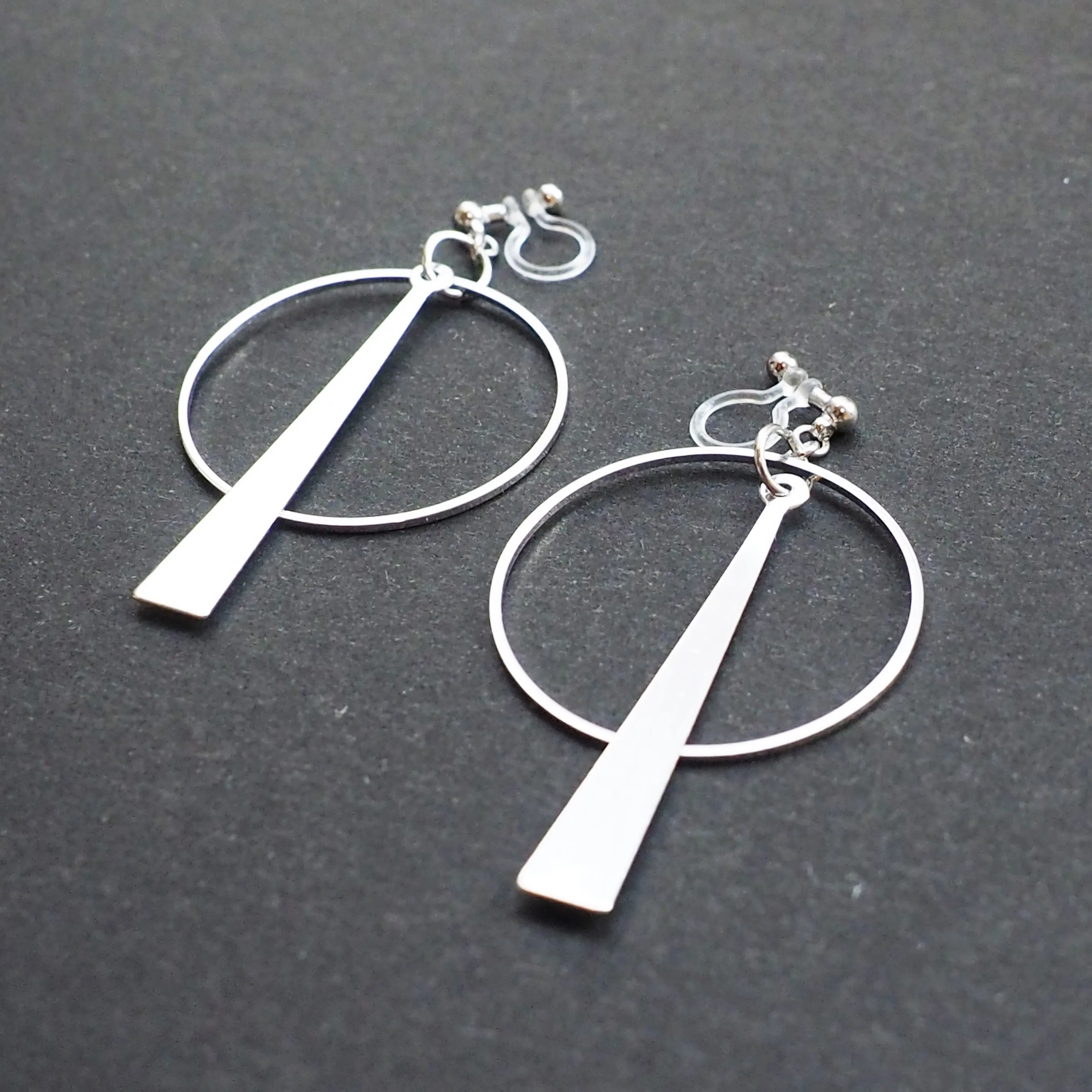 Geometric silver hoop invisible clip on earrings