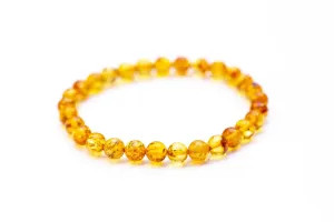 Honey Amber Sphere Bead Bracelet - Natural Baltic Amber, Polished Finish, Unisex Design