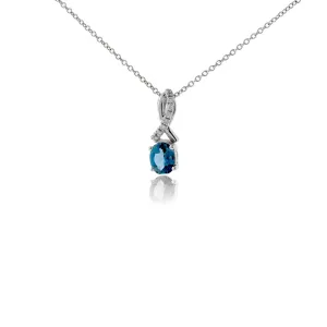 Oval Shaped Aquamarine & Diamond Halo Pendant