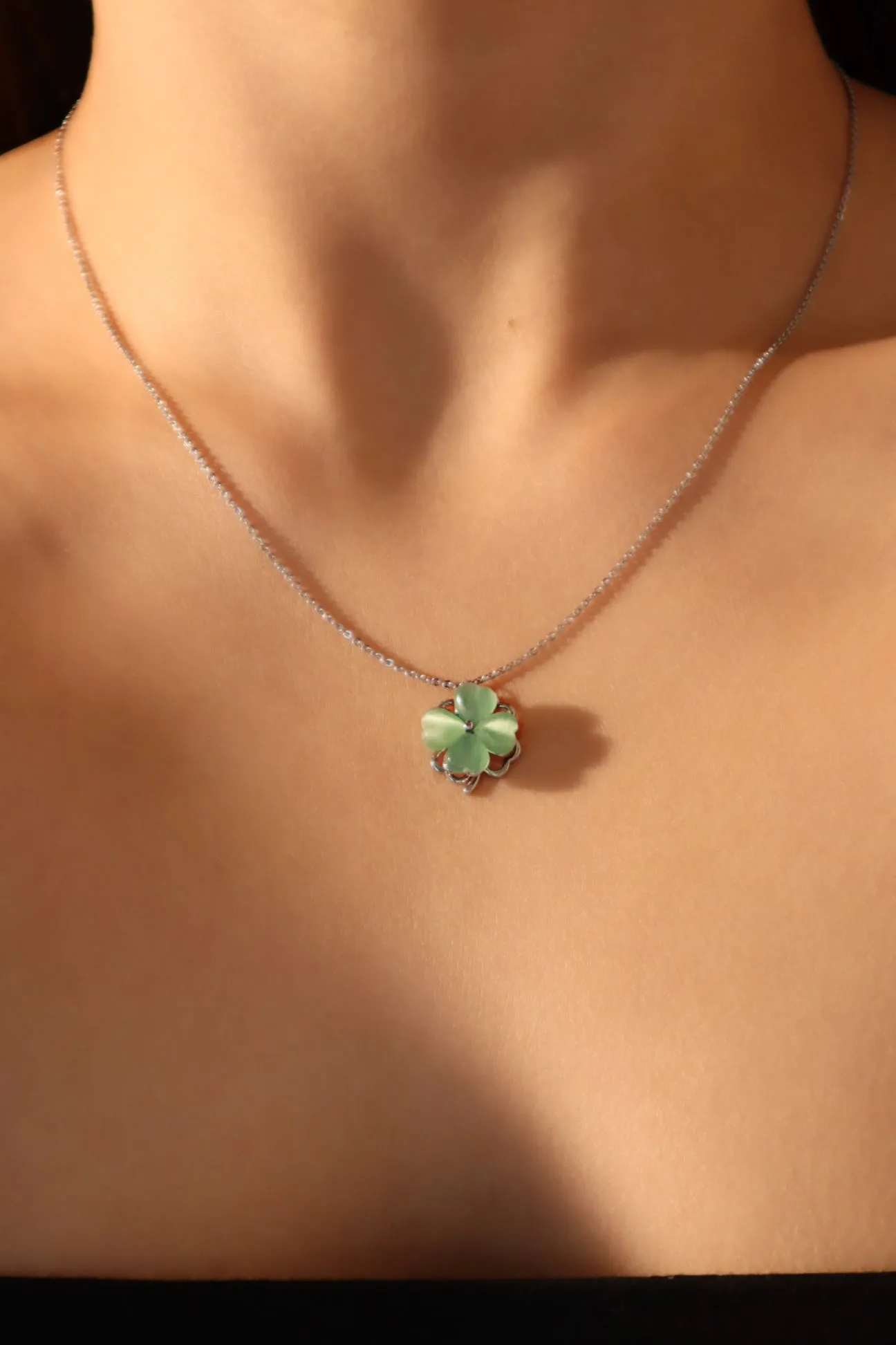 Platinum Plated Spinning Jade Clover Necklace