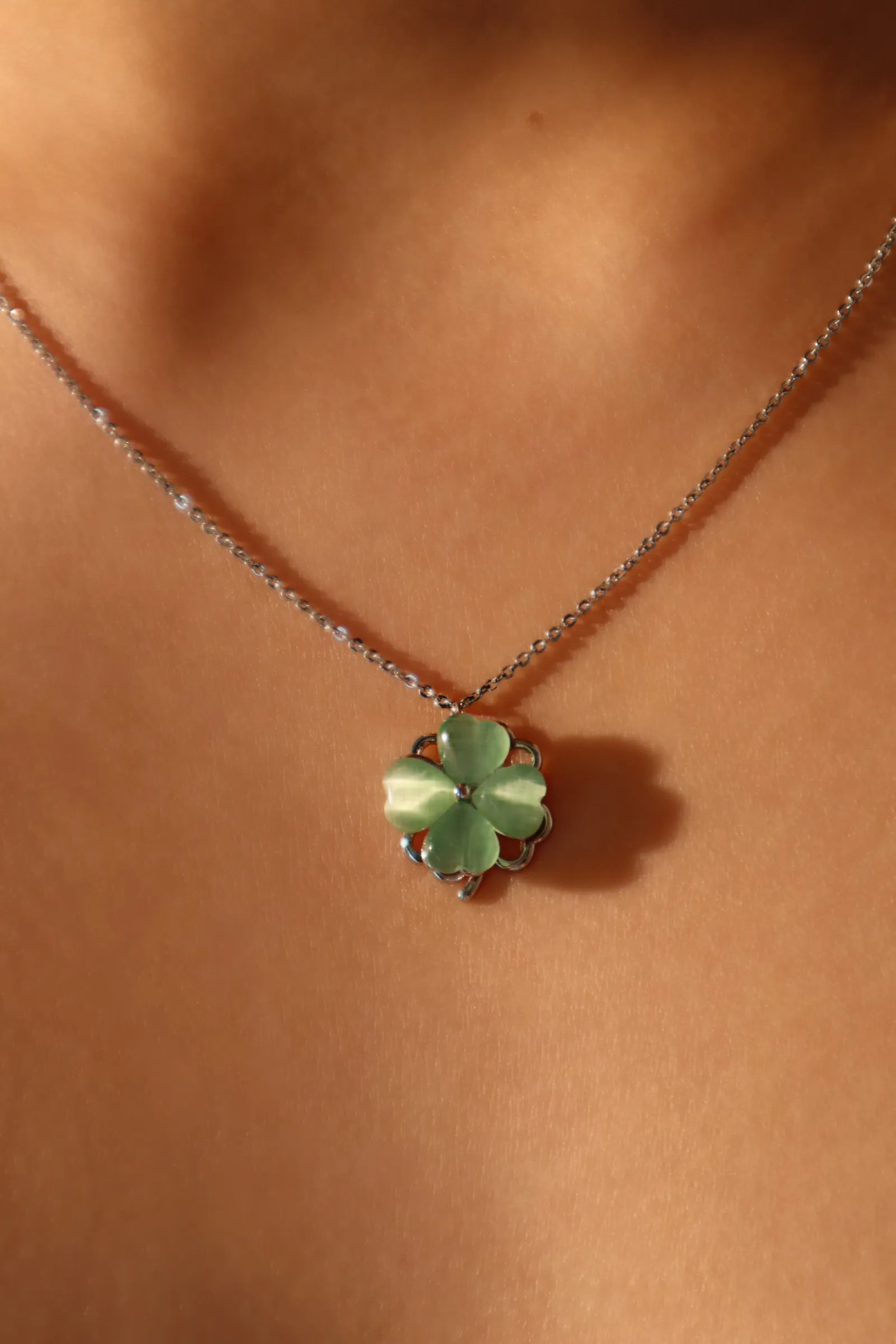 Platinum Plated Spinning Jade Clover Necklace