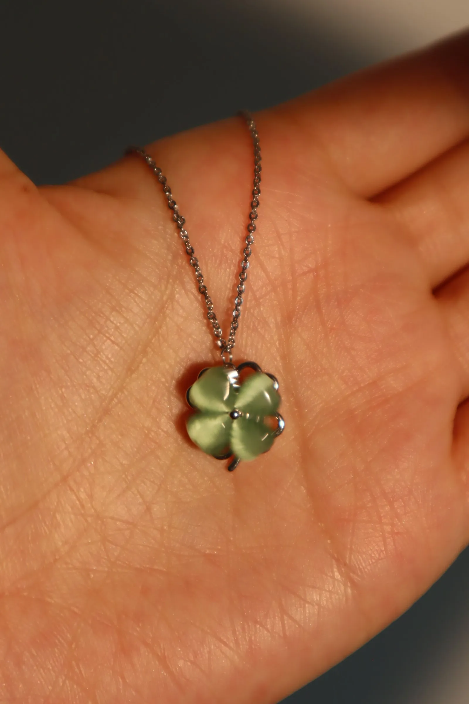 Platinum Plated Spinning Jade Clover Necklace