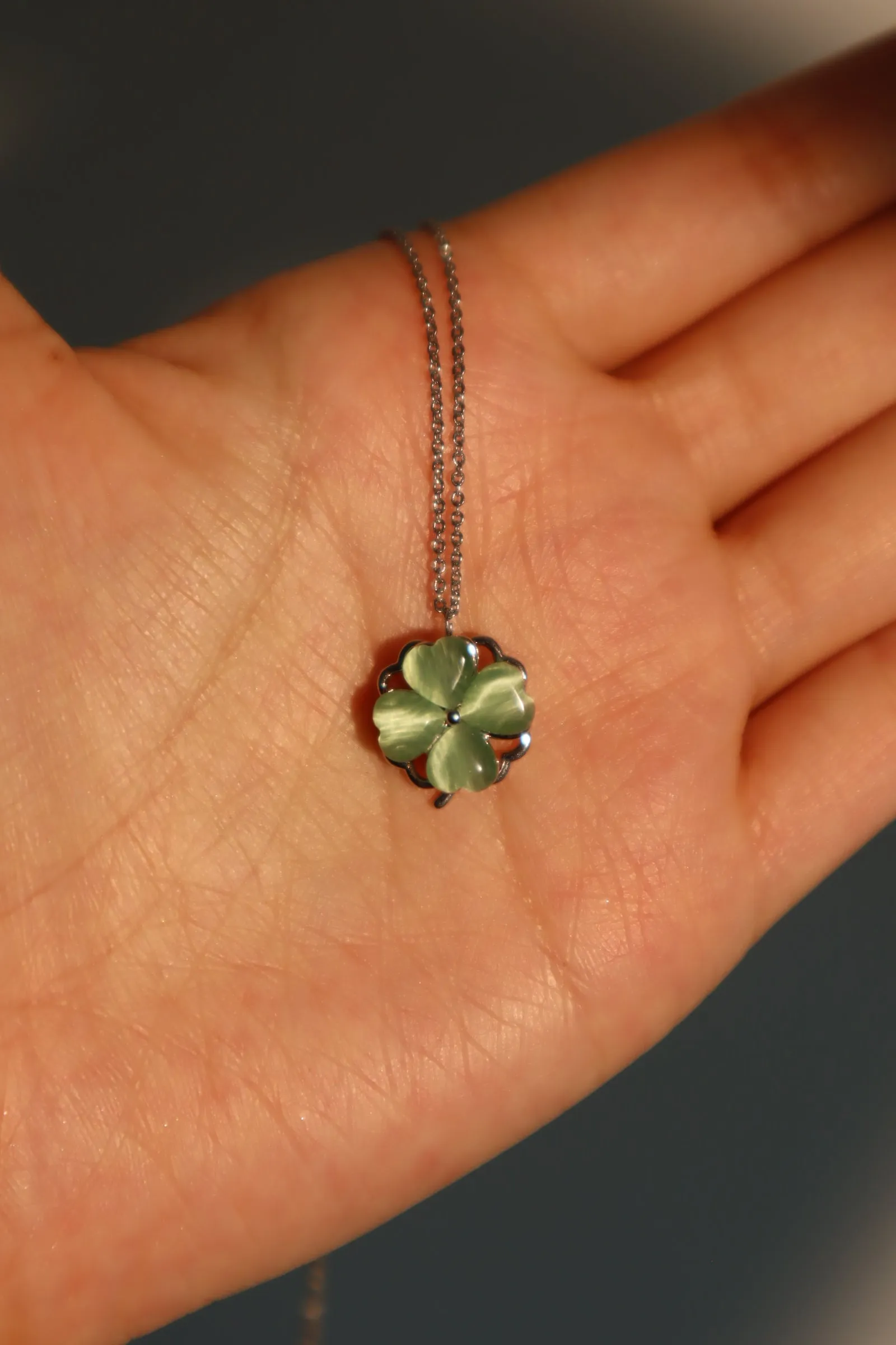 Platinum Plated Spinning Jade Clover Necklace